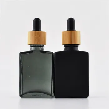 бамбук краен e juice правоъгълна стъклена бутилка от 30 ml matte black квадратна стъклена бутилка-за краен етерично масло с бамбук капак