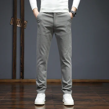 Пролетно-есенни мъжки ежедневни панталони 2023, есенно-зимни нови утягивающие корейската версия панталони, мъжки свободни спортни панталони с прав штанинами